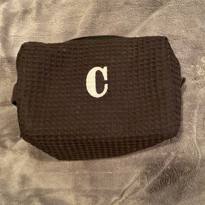 Makeup bag with “C” on it